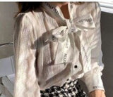 woloong French style restoring ancient ways ribbon bow blouse female temperament of early spring new white shirt long sleeve lace tops