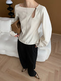 woloong Solid Color Belly-Hollow Asymmetric Puff Sleeves Loose Round-Neck Blouses&Shirts Tops