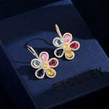 2025 Designer earrings trendy micro-inlaid zircon niche temperament earrings wholesale light luxury high-end color flower earrings