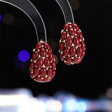 2025 Autumn and winter high-end inlaid pearl earrings s925 silver needle light luxury celebrity simple retro pomegranate red fashion stud earrings