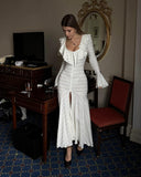 spring new light luxury knitted dress women's long-sleeved horn-sleeved thin ruffle edge split-ended big swing dress