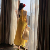 2025 high-end vacation style yellow super fairy backless neck dress women's summer temperament seaside beach skirt