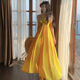 2025 high-end vacation style yellow super fairy backless neck dress women's summer temperament seaside beach skirt