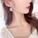 2025 Designer earrings trendy micro-inlaid zircon niche temperament earrings wholesale light luxury high-end color flower earrings