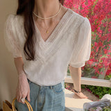 2025 floral chiffon shirt women's short-sleeved loose shirt spring and summer V-neck ruffle edge top design sense niche