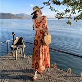 2025 retro orange v-neck printed suspender dress for women's summer new seaside vacation super good-looking temperament dress