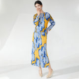 2025 suit women's spring two-piece fashion printed long-sleeved loose T-shirt top side split hip skirt