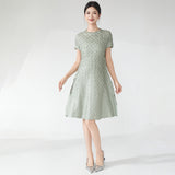 2025 Fashion women's summer dress design a hand-pleated loose round neck solid color versatile short-sleeved  medium and long dress