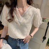2025 floral chiffon shirt women's short-sleeved loose shirt spring and summer V-neck ruffle edge top design sense niche