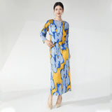 2025 suit women's spring two-piece fashion printed long-sleeved loose T-shirt top side split hip skirt