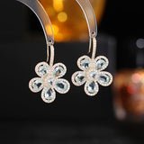 2025 Designer earrings trendy micro-inlaid zircon niche temperament earrings wholesale light luxury high-end color flower earrings