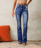 2025 New retro ripped jeans women's clothing  spring new washed street slightly pulled trousers