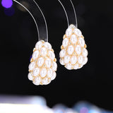 2025 Autumn and winter high-end inlaid pearl earrings s925 silver needle light luxury celebrity simple retro pomegranate red fashion stud earrings