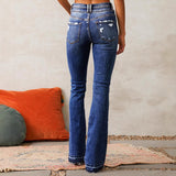 2025 New retro ripped jeans women's clothing  spring new washed street slightly pulled trousers