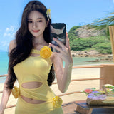 2025 Beautiful and unique seaside vacation, sexy hollow yellow flower suspender dress, slim-fitting hip skirt