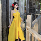 2025 high-end vacation style yellow super fairy backless neck dress women's summer temperament seaside beach skirt