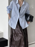 2025  2025 early spring new top design lazy loose blue and white stripes loose simple shirt women 1609