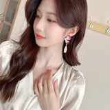 2025 light luxury earrings angel wings water drop zircon earrings women's s925 silver needle niche high-end earrings