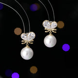 2025 Autumn and winter New Year's earrings niche design earrings temperament exquisite women's s925 silver needle love zircon pearl stud earrings