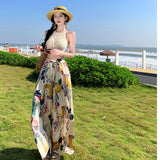 2025 Dopamine graffiti print wide-leg pants women's summer seaside wear high-waisted beach culottes drape split-ended color pants