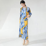 2025 suit women's spring two-piece fashion printed long-sleeved loose T-shirt top side split hip skirt