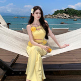 2025 Beautiful and unique seaside vacation, sexy hollow yellow flower suspender dress, slim-fitting hip skirt