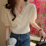 2025 floral chiffon shirt women's short-sleeved loose shirt spring and summer V-neck ruffle edge top design sense niche