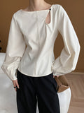 woloong Solid Color Belly-Hollow Asymmetric Puff Sleeves Loose Round-Neck Blouses&Shirts Tops